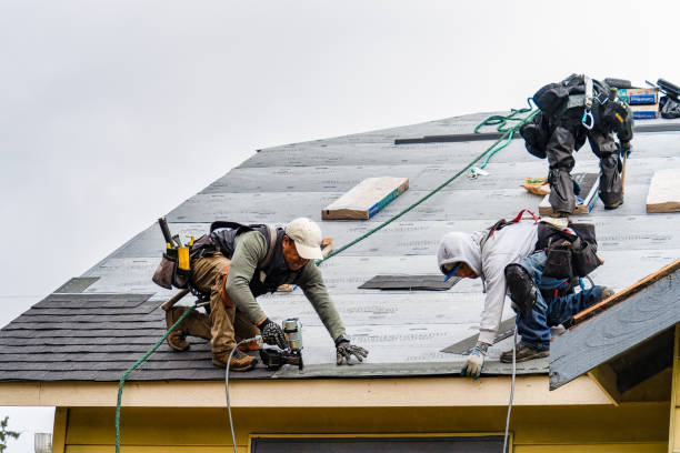 Professional Roofing technician working in Avon, NY